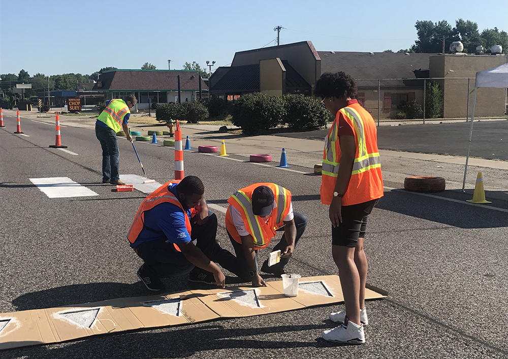 Construction workers on road