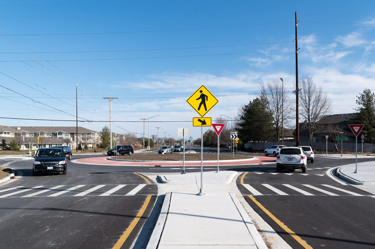 Cars driving through the Iles/Archer Elevator Roundabout