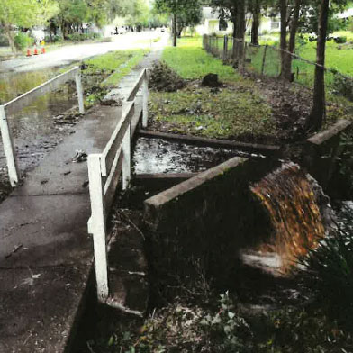 A destroyed culvert on Clark Avenue in the wake of Hurricane Irma